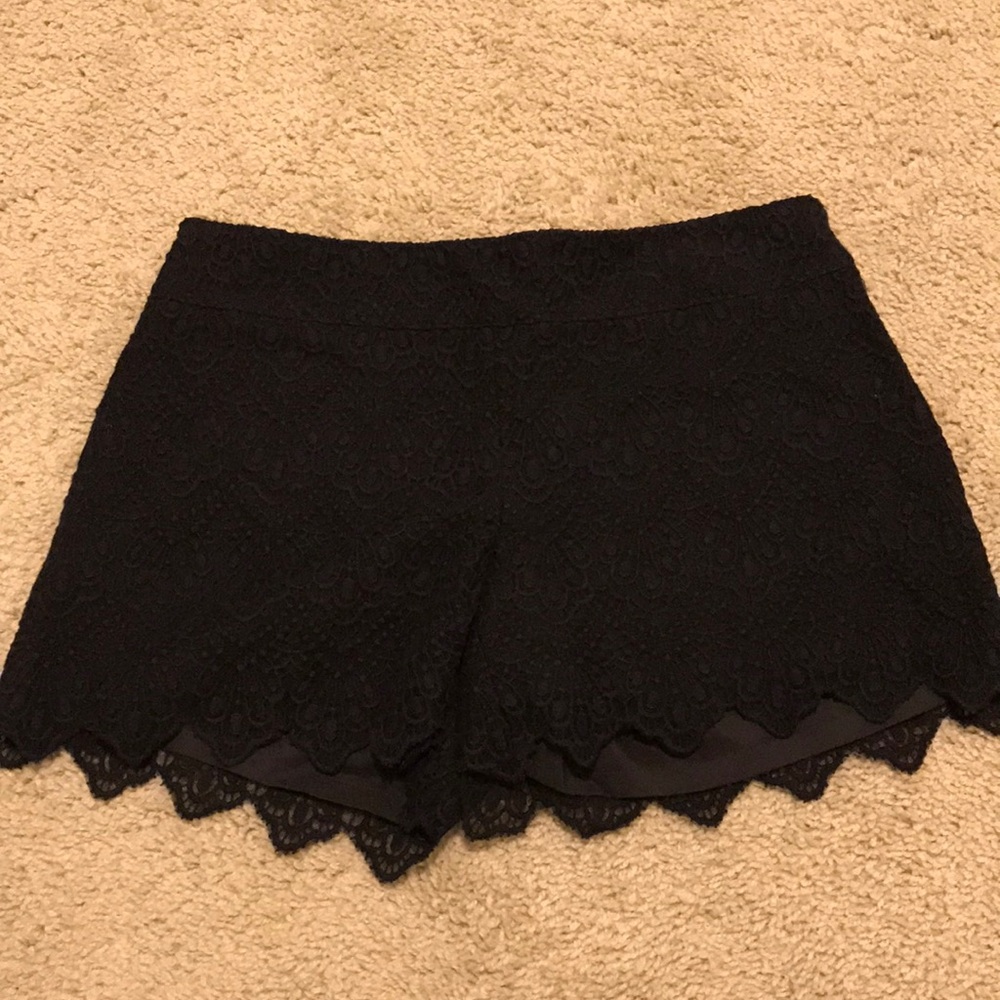 NWOT black lace side zip shorts size 2